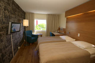 Double room with black floor